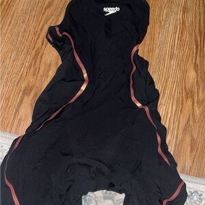 Speedo Black and Gold tech suit worn